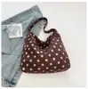 Bolsa de terciopelo de nicho de comercio exterior para mujer, nuevo modelo 2026, bolso de hombro y axila de gran capacidad, bolsa de mano tote versátil casual para el día a día