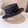 Chapéu de luxo leve, fio de cânhamo filipino, fita de pérola, chapéu plano feminino, primavera e verão, todos os tipos de proteção solar, chapéu de palha, moderno