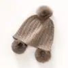 Novo gorro de tricô outono/inverno com padrão torcido, feito de 100% caxemira pura, com pompom, cor sólida, quente, versátil e projetado para mantê-lo aquecido no tempo frio