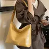 Estilo de Viaje para Mujer Nuevo Gran Capacidad 2026 Cuero de Cera de Abeja Bolso de Hombro Único Suelto Textura Bolso Grande Bajo el Brazo Ligero Simple