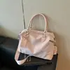 Bolso Boston de Mano Simple de Gama Alta para Mujer 2026 Nuevo Estilo Bolso de Hombro Único para Viajes Diarios Bolso Cruzado Versátil de Gran Capacidad