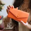 Billetera Larga de Cuero Genuino para Mujer Multifuncional de Gran Capacidad 2024 Nuevo Estilo Elegante Bolso de Mano Pequeño para Teléfono Móvil Billetera