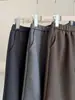 Saia Reta Elegante da Moda Estilo Coreano com Barra Dobrada Cinco Pontos Feminina Outono Novo Estilo Fenda nas Costas Emagrecedora Versátil Saia para Conjunto