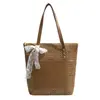 Bolsa de Palha Trançada Yuezi Spring de Grande Capacidade Fashion para Mulheres 2026 Novo Estilo Bolsa de Ombro Vazada Personalizada Bolsa de Praia