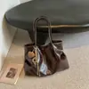 Bolsa grande retrô casual transfronteiriça para mulheres, nova bolsa tote casual para o dia a dia, bolsa de ombro de grande capacidade moderna para o trabalho