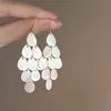 Atrapados en los Años Fluyentes Exóticos Pendientes de Borla de Mariposa Retro de Gama Alta Nicho Temperamento Pendientes de Estilo Bohemio