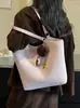 Yuezhi 2026 principios de otoño nueva moda bolso retro con estampado de leopardo, bolso de hombro para el trabajo, bolsa tote tipo cubo popular de venta caliente