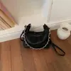Bolsas de mano de diseñador únicas para mujer, nueva bolsa cruzada vintage verano 2026, comercio exterior transfronterizo, bolsa de cadena de albóndiga de alta gama