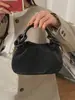 Bolso plisado de moda nicho 2026 Primavera Nuevo estilo Bolso cruzado de hombro para mujer personalizado Bolso cruzado casual texturizado para el día a día