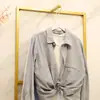 Estante de exhibición de ropa al por mayor del fabricante, perchero de pared, estante de pared para tienda de ropa de mujer, combinación de estantes para colgar ropa