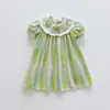 Vestido de niña con cuello Peter Pan, lazo bordado y manga corta, estilo verano 2026, rayas coloridas, dulce vestido de princesa, versión coreana
