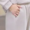 Conjunto esportivo moderno para mulheres 2026 primavera e outono novo conjunto estiloso que rejuvenesce para mães de meia-idade e idosas, roupa casual para corrida que emagrece
