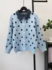 Outono/Inverno 2026 Novo Cardigan de Tricô com Retalhos de Poá em Jeans Falso Duas Peças Design Solto Casaco Suéter para Mulheres Tendência