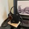 Bolso de mano estilo coreano para mujer, nuevo modelo principios de otoño 2026, bolso de cubo con estampado de leopardo de alta costura, nicho, para hombro