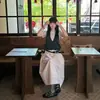 Conjunto Nuevo Estilo Coreano Primavera/Verano 2026: Camiseta Blanca Versátil, Top sin Mangas de Cuello Halter con Lunares, Conjunto de Tres Piezas con Falda de Corte A