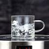 Taza de té de vidrio de borosilicato alto al por mayor de fábrica con asa, taza de té de kung fu transparente, taza de degustación de vidrio pequeña.