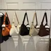 Bolsa de Ombro Cruzada Versátil Simples Casual Elegante Texturizada de Grande Capacidade Nova Moda Outono 2026 Nicho de Alto Valor Estético