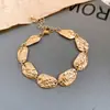 Pendientes Ovalados Metálicos Plegados Transfronterizos Europeos y Americanos, Conjunto de Collar y Pulsera, Cadena para Clavícula de Moda, Joyería de Gama Alta de Nicho