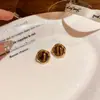 Aretes de aro huecos estilo retro europeo y americano para mujer, a la moda, lujo ligero, aretes elegantes de alta gama en turquesa estilo francés