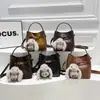 Bolso de Cubo Retro Simple Versátil de Gamuza 2026 Nueva Moda Tendencia Otoño e Invierno Bolso de Hombro Cruzado para Mujer