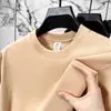 Camiseta de algodón puro de manga corta para verano para hombre, transpirable y de corte holgado, camiseta de cuello redondo para jóvenes y adultos de mediana edad, top versátil y moderno de color liso