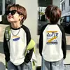 Ropa interior térmica de forro polar para niños 2026 Otoño/Invierno Nuevo estilo Camiseta de manga larga con cuello redondo y bloques de color para niños Ropa de Otoño/Invierno
