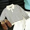 Conjunto de polo a rayas de manga larga para niño estilo coreano de otoño 2026 nuevo moderno versátil pantalones casuales para niños