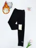 Leggings Gruesos Forrados de Felpa para Niñas Otoño e Invierno 2026 Pantalones Clásicos de Moda Versátiles Bordados con Letras Ropa de Abrigo para Niños