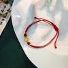Nuevo colgante de calabaza Yuan Bao de cuerda roja tejida a mano estilo chino Joyería Nuevo Cuerda de mano ajustable de la suerte para hombres y mujeres