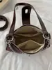 Bolso de mujer de comercio exterior, nuevo modelo otoño 2026, bolso baguette simple y versátil, diseño de moda nicho, bolso de hombro y para debajo del brazo
