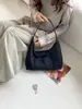 Bolso de mano casual y relajado estilo coreano 2026 para mujer, un bolso de axila de nicho, minimalista y ligero