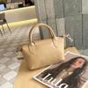 Bolso de mujer 2024 nuevo de piel auténtica, bolso bandolera de alta gama, bolso de hombro portátil para uso diario.
