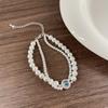 Pulsera de perlas de doble capa retro francesa diseño para mujer lujo ligero de alta gama temperamento moda simple combinable pulsera pulsera