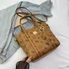 Bolso de Mano de Lujo de Nicho para Mujer 2026 Nuevo Moda Tendencia Monograma Cruzado al Hombro Versátil Bolso Cubo para el Trabajo