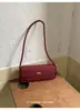 Moda Transfronteiriça Retrô Bolsa de Ombro Feminina 2026 Nova Bolsa Baguete de Nicho Francês Moda Sensação de Alto Padrão Bolsa de Ombro