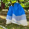 Suministro Directo de Fábrica de Bolsas Especiales para Uvas Rosa Sol, a Prueba de Pájaros, a Prueba de Insectos, Impermeables, Bolsas de Tres Colores 28*36 Bolsas de Papel para Frutas