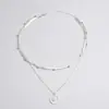 Collar con colgante de loto multicapa simple y nuevo con personalidad de moda popular recomendado en Europa y Estados Unidos, cadena para el cuello con cadena de cuchillas para mujer.
