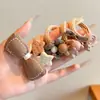 Venta al por mayor de fábrica Ligas para el cabello personalizadas para niños Ligas para el cabello estilo coreano para niñas Bandas de goma de alta elasticidad y durabilidad Ligas para el cabello Accesorios para el cabello