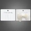 Tarjeta decorativa popular de color blanco lechoso de 9,0 cm, tarjeta de horquilla blanca de luna de lado cuadrado de PVC de nicho de alta gama