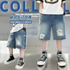 Shorts Jeans de Verão para Meninos 2026 Novo Estilo Roupa Infantil Versão Coreana Fresco e Estiloso Roupa de Trabalho Versátil Calça de Cinco Pontos Calça de Comprimento Médio