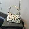 Bolso de Mano de Moda de Alta Gama para Mujer 2025 Nuevo Nicho Lujo Accesible Bolso de Hombro para Viajeros Estilo Extranjero Bolso Bandolera Versátil