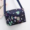 Bolsa de pano de flores Nova bolsa crossbody feminina Pano Oxford Bolsa de mãe de meia-idade e idosa Bolsa Bolsa de ombro multicamadas Bolsa de lona