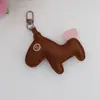 "Hazte rico pronto" llavero creativo, llavero de coche, colgante para bolso, adorno de caballito, accesorio para mochila y funda de teléfono