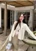 Cárdigan de punto para mujer con hilo de torsión de tres cabos, estilo nuevo de principios de primavera 2026, chaqueta suéter suave y acogedora de punto de ochos con diseño de corazón