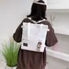 2025 Nuevo Estilo Coreano Bolso de Lona de Color Puro Simple Mochila Ligera Moda para Estudiante de Primaria Bolso Tote Escolar de Moda