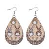 Pendientes colgantes de piel sintética de doble cara con diseño de conejo de Pascua con estampado de leopardo de Amazon para mujer, de Amazon, para Europa y América.