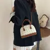 Bolsa de Concha Retrô Francesa de Nicho Feminina 2025 Nova Moda Estilo Hong Kong High-End Bolsa Feminina de Ombro Único Transversal