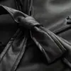 Atacado de fabricante de roupas femininas transfronteiriço 2026 AliExpress item mais vendido jaqueta de couro justa de manga comprida estilo europeu e americano com cintura de amarração e lapela