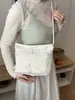 2026 Verano Nuevo Estilo Casual Dulce Moda Coreana Textura Tejida Versátil Bolso de Hombro Cruzado al por Mayor Bolso de Mujer