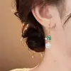 Pendientes de Borla con Cuentas de Cristal de Flor de Loto Goteando Aceite Nuevo Chinoiserie Lujo Accesible Pendientes de Gancho para Oreja de Nicho Pendientes Elegantes de Gama Alta para Mujer